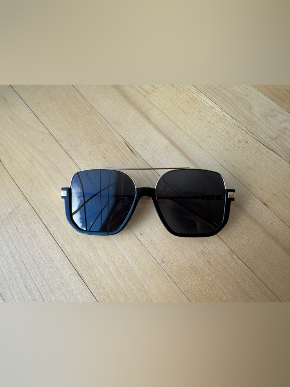 Oversized black and gold square sunglasses